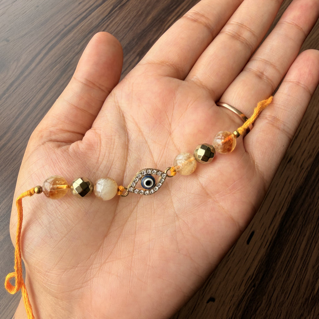 Citrine & Golden Pyrite Evil Eye Rakhi for Wealth, Protection & Success