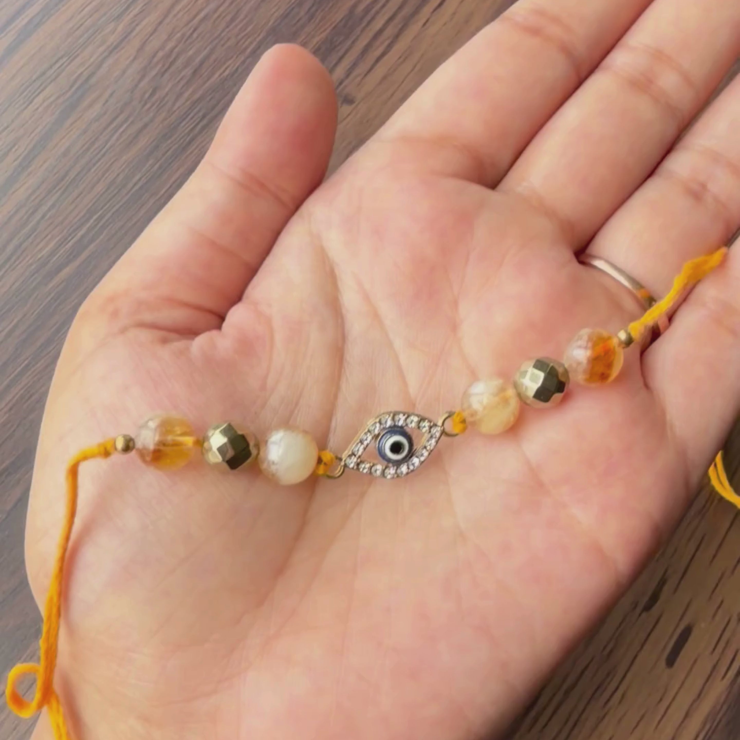 Citrine & Golden Pyrite Evil Eye Rakhi for Wealth, Protection & Success