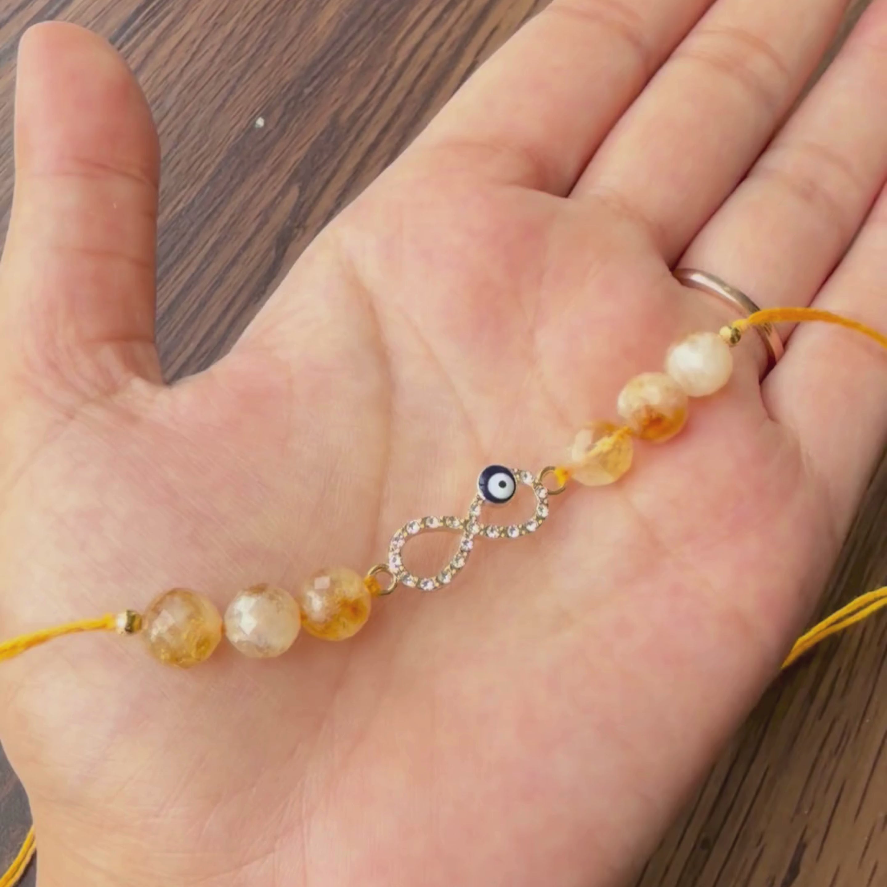 Citrine Evil Eye Infinity Rakhi for Success, Positivity & Protection